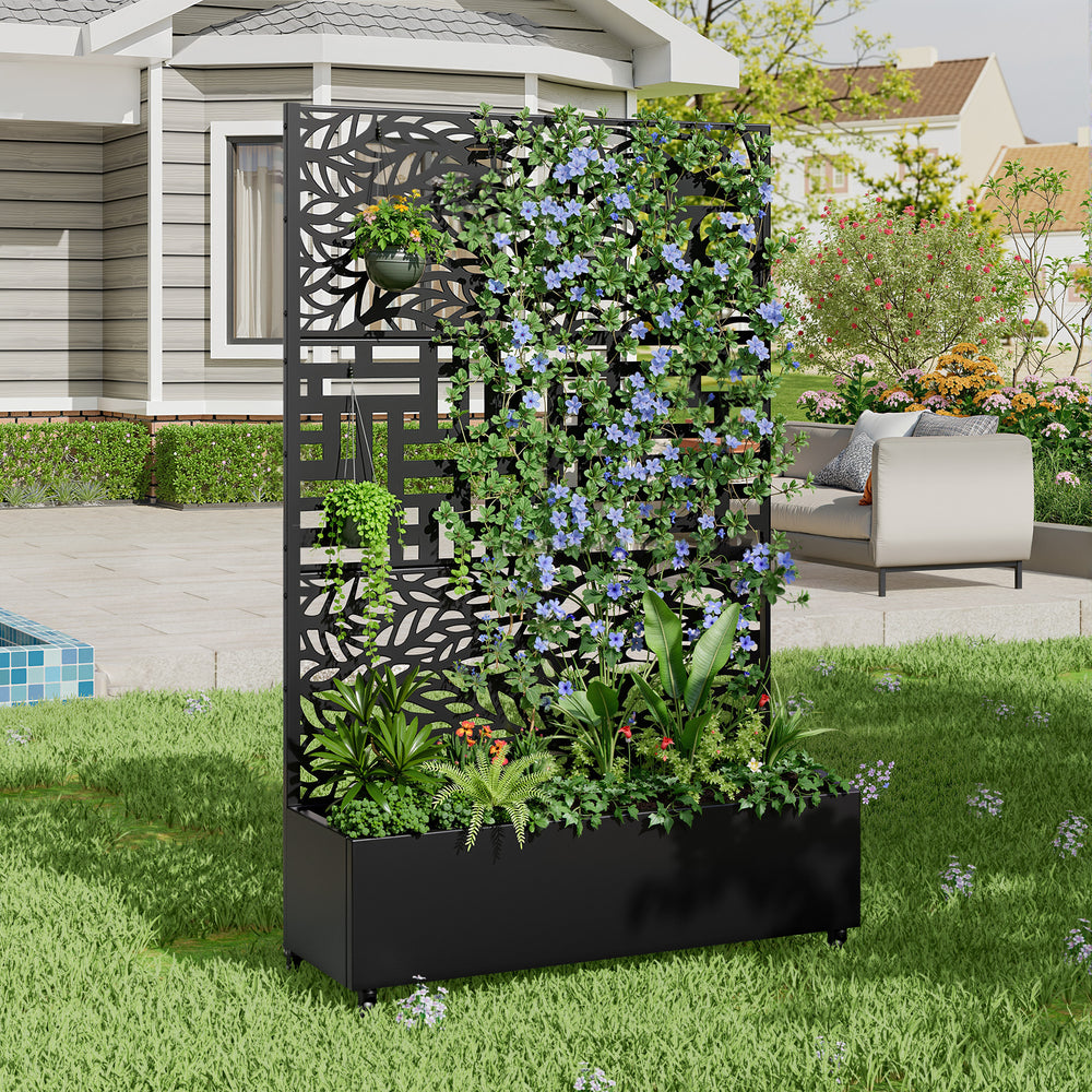 Flowing leaf and linear metal privacy screen with planter box
