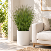 Artificial grass plants styled for a covered patio or porch