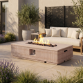 Natural Travertine Outdoor Fire Pit Table complete outdoor living setup with privacy screen and greenery