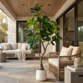 6 ft artificial fiddle leaf fig tree with decorative white pot styled in a modern outdoor patio